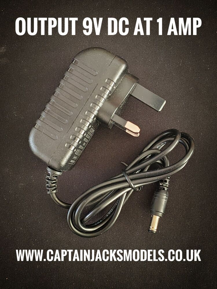 Mains 3 Pin UK Plug With Barrel Pin Output At 9v DC 1A