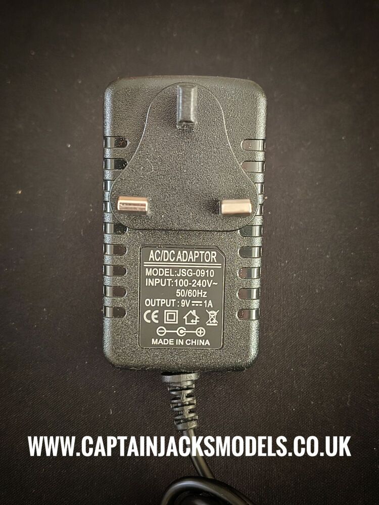 Mains 3 Pin UK Plug With Barrel Pin Output At 9v DC 1A