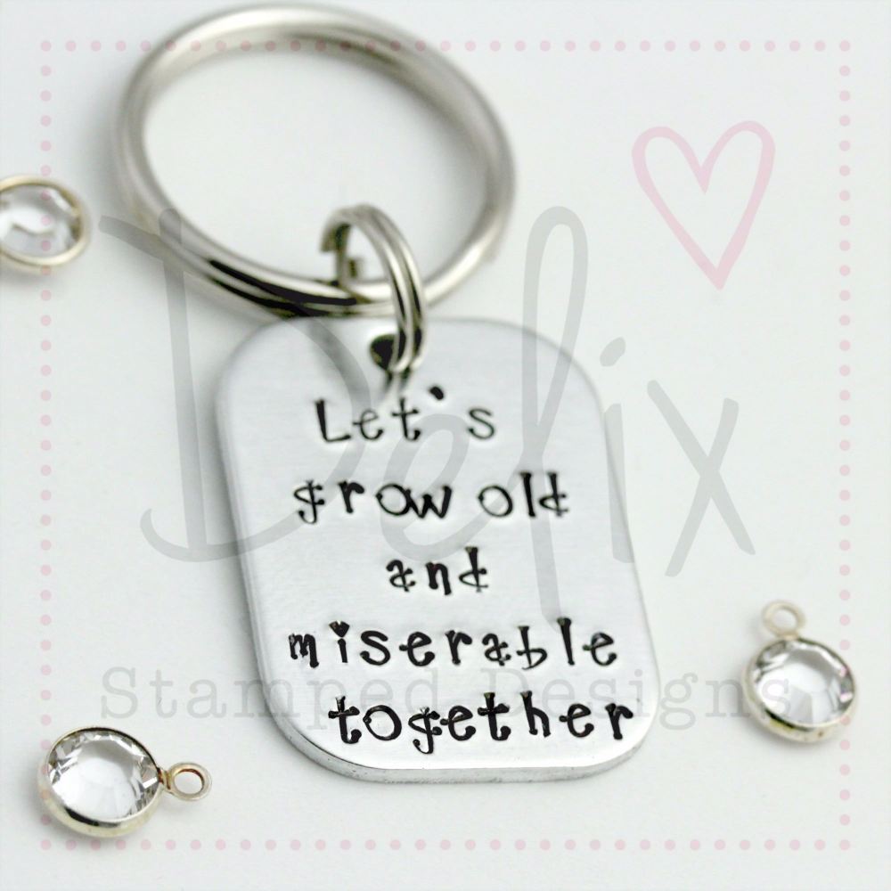 'Let's grow old and miserable together' curved rectangle keyring