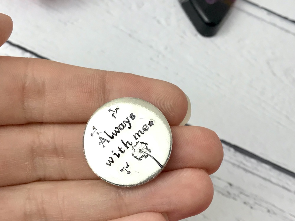 Hand stamped message pebble