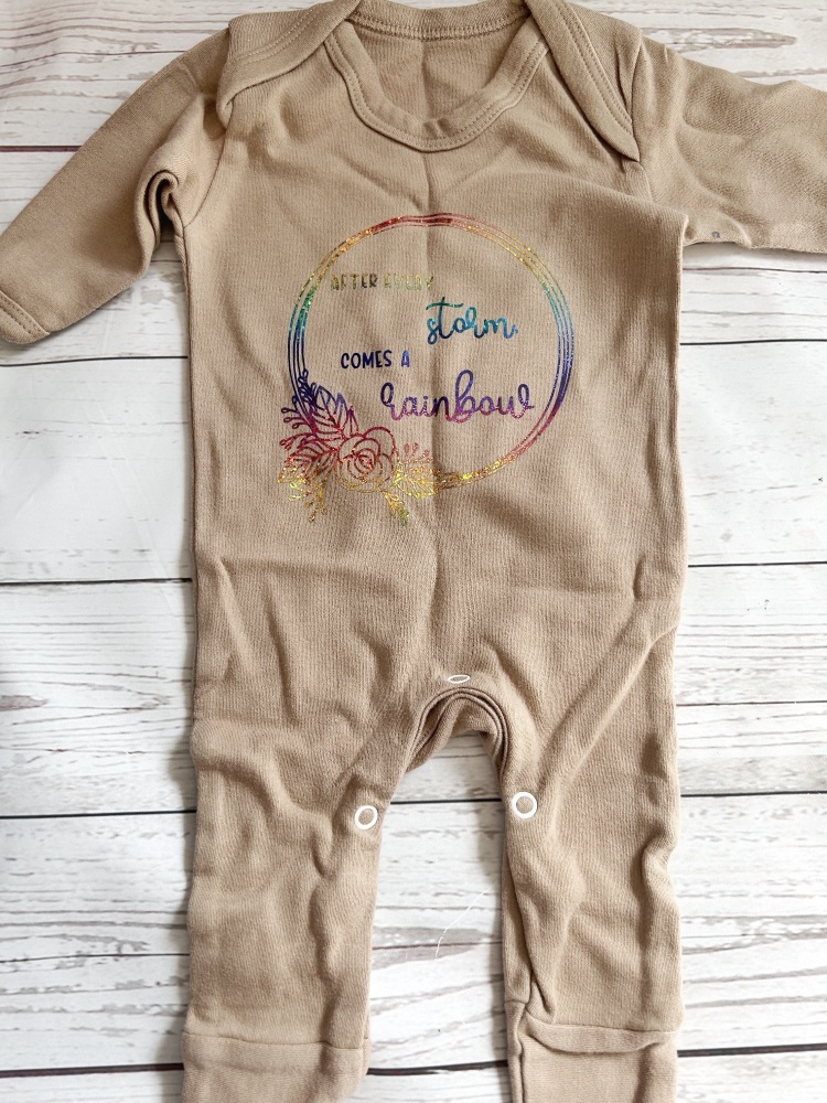 After every storm, comes a rainbow babygrow newborn size