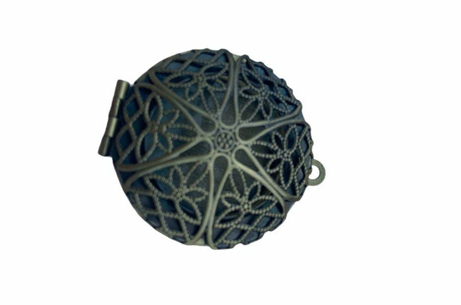 Bronze style circular filigree locket - A10