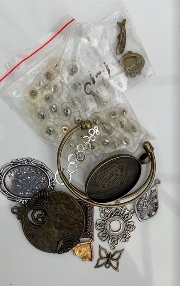 a sample pack of mixed bezels and findings