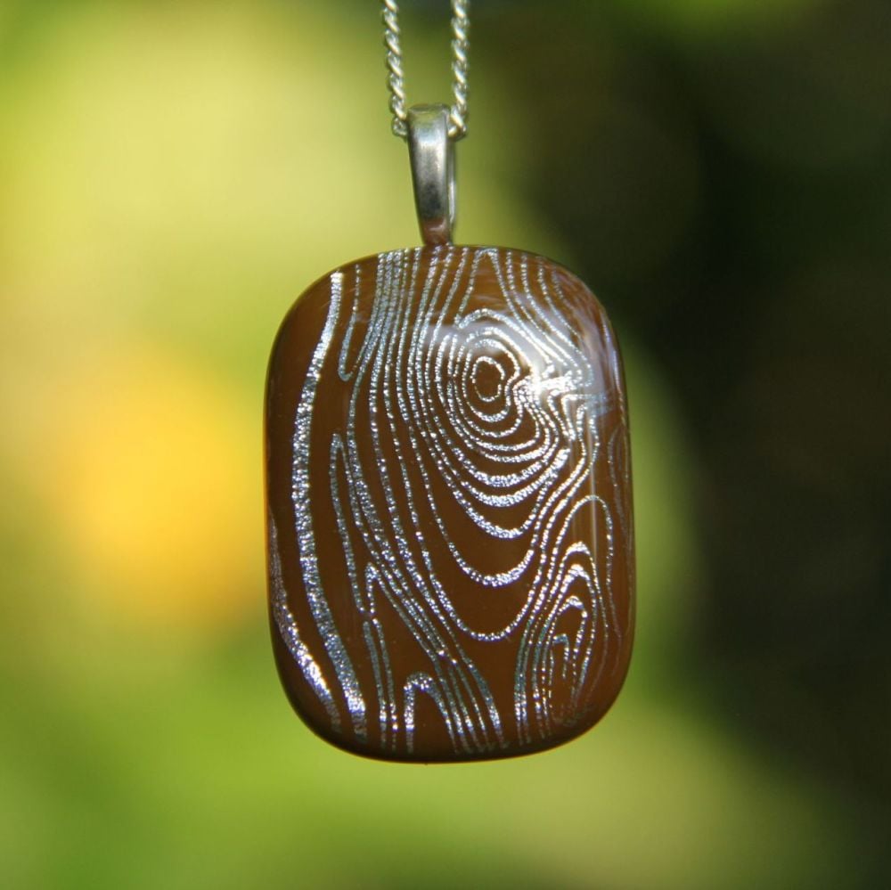 Dichroic glass pendant with wood grain