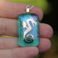 Silver and turquoise dragon irid glass pendant