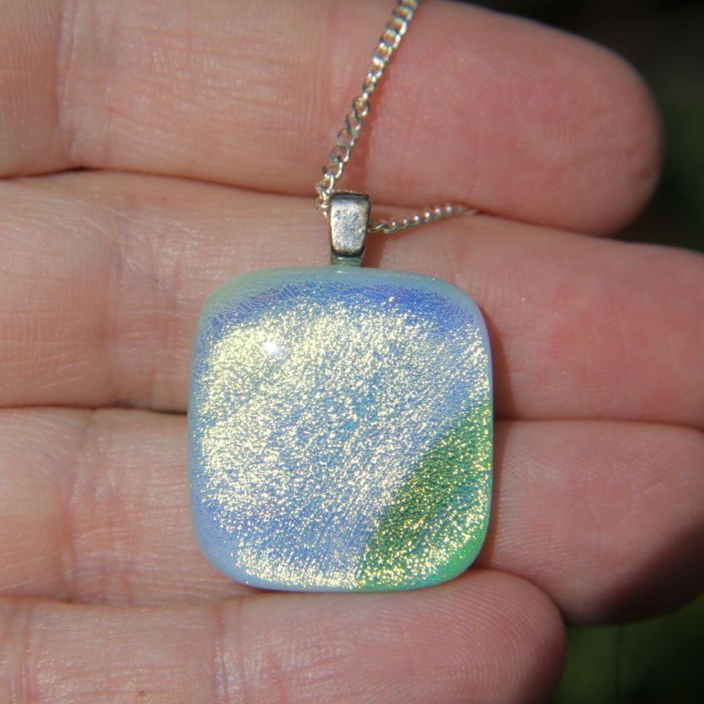 Pale green sparkly dichroic glass pendant 