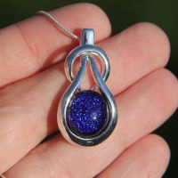 Sapphire blue dichroic knot pendant
