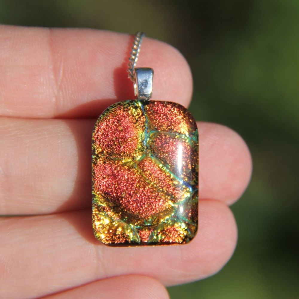 Molten lava dichroic glass pendant