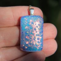 Textured red gold dichroic glass pendant