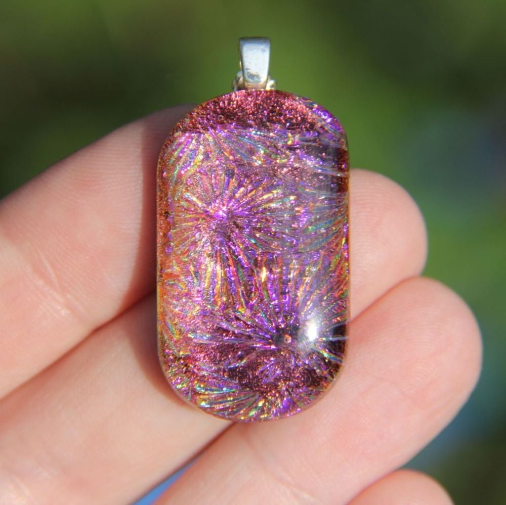 Orange and purple flower dichroic glass pendant