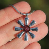 Dark red dichroic flower pendant 