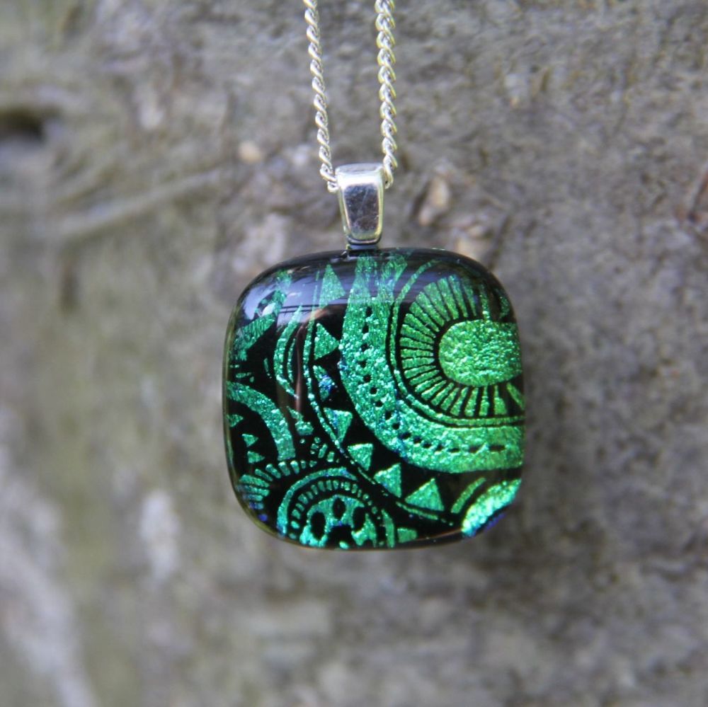 Small green sun ray dichroic glass pendant