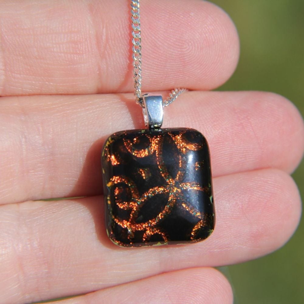 Small orange red swirl dichroic glass pendant