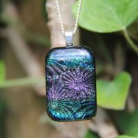 Teal and purple dichroic flower pendant