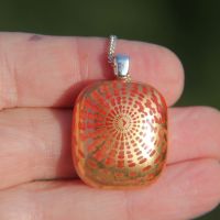 Orange and gold glass pendant