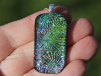 Green and purple dichroic flower pendant