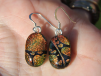 Swooping red heart dichroic glass earrings