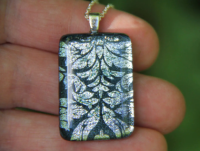 Silver floral dichroic glass pendant