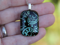 Pale green and black sweet pea pattern dichroic glass pendant