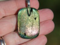 Gold to pink dichroic glass pendant, Mardi Gras