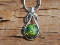 Green gold dichroic glass knot pendant,