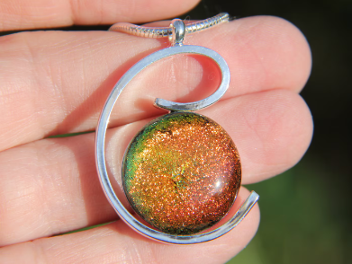 Dichroic glass orange wave pendant, circle