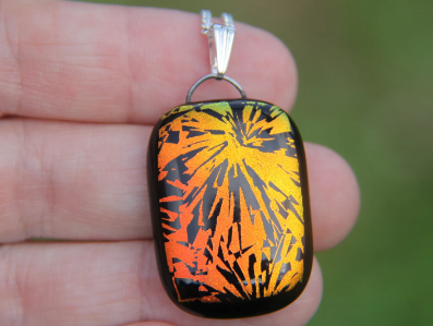 Reversible orange burst green blue dichroic glass pendant,