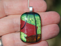 Gold and red dichroic glass pendant