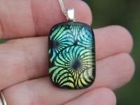 Gold, blue green swirl pattern dichroic glass pendant