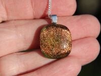 Small red orange dichroic glass pendant