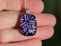 Small pink dichroic glass  line pattern pendant