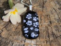 Silver paw print dichroic glass pendant