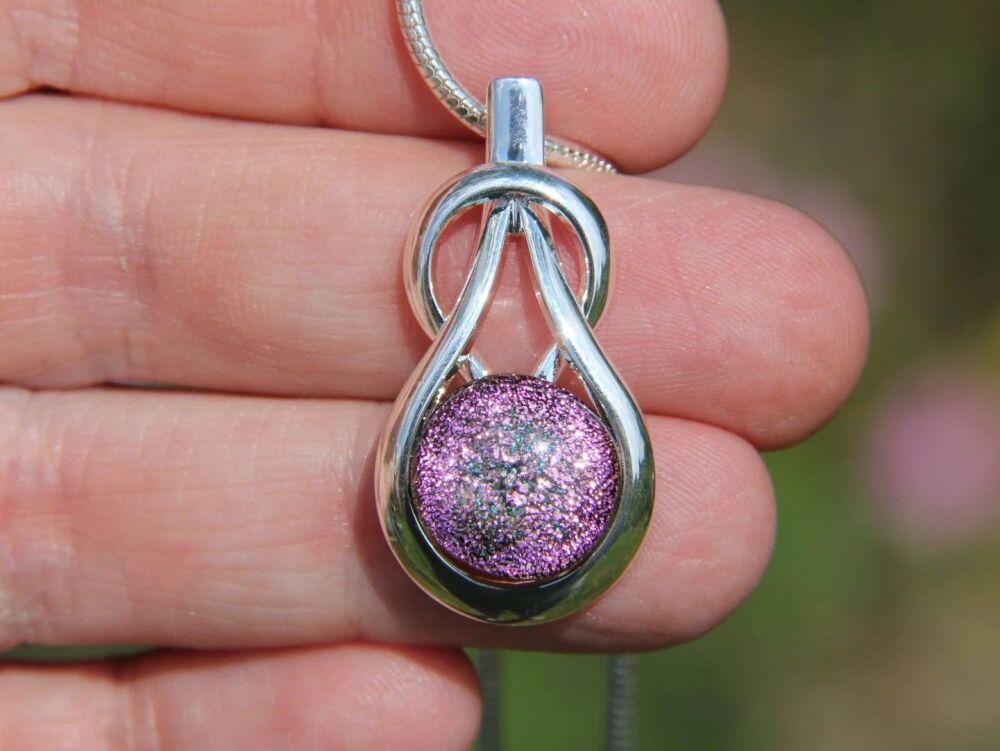 Pale pink dichroic knot pendant