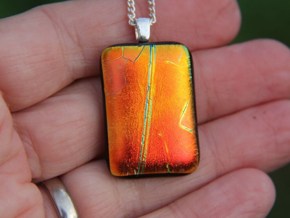 Orange dichroic streamer dichroic glass pendant
