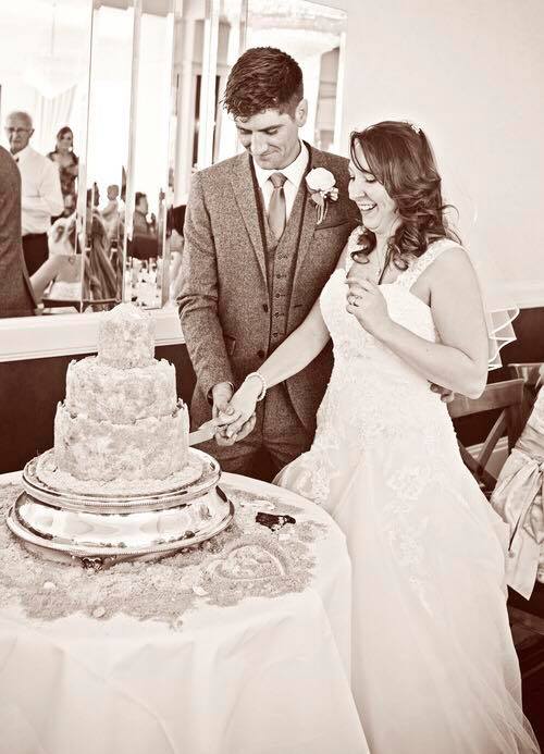 Sand castle wedding cake.