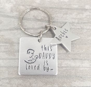 This Daddy Is Loved By.. Keyring