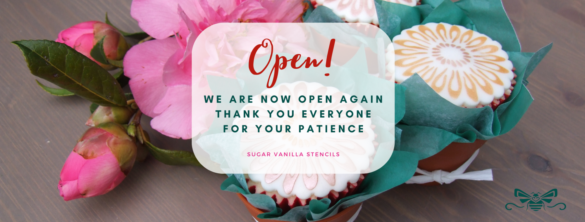 Image of flower cupcakes. Message reads: Open. We are now open. Thank you to all our customers for their patience.