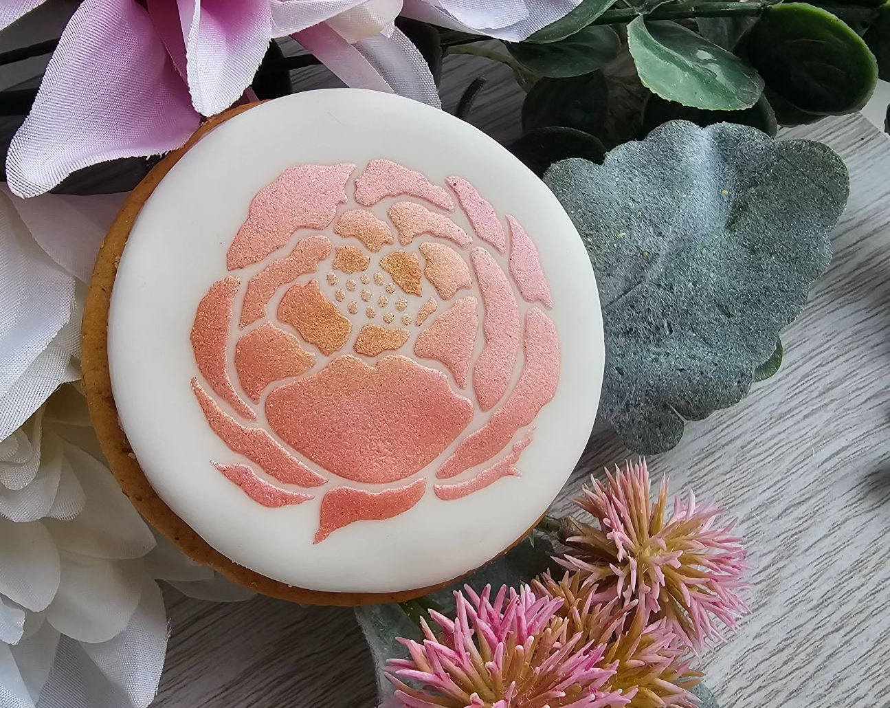 Peony stencil on a cookie