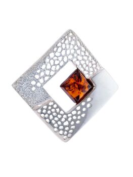H022 - 601 - Amber and sterling silver contemporary brooch.