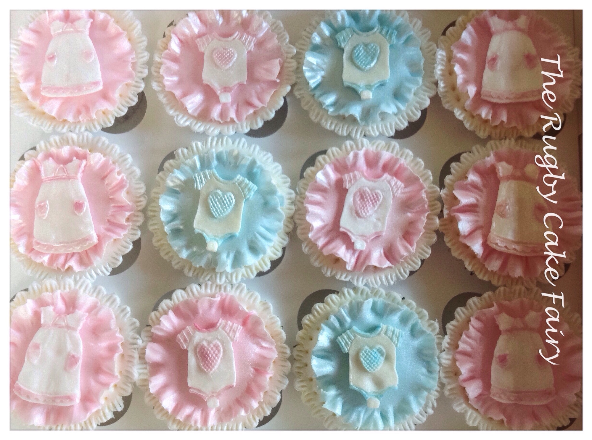 Baby clothes cupcakes