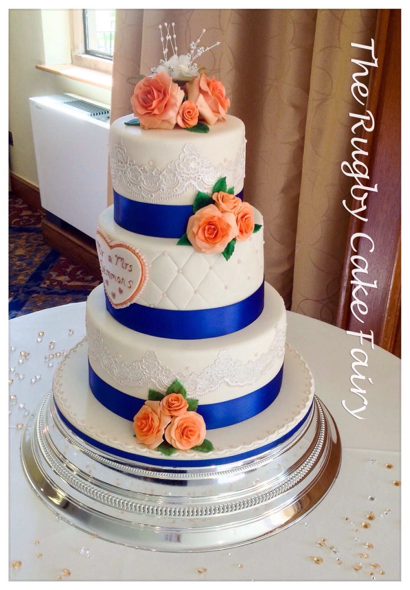 peach and lace wedding cake side view