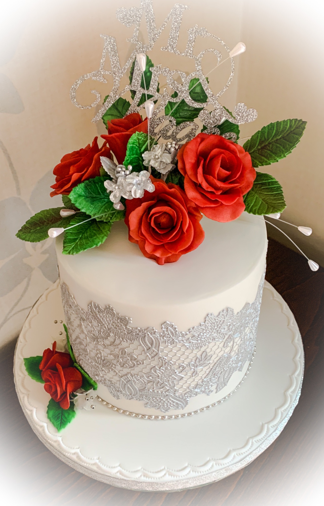 Silver lace and red rose wedding cake