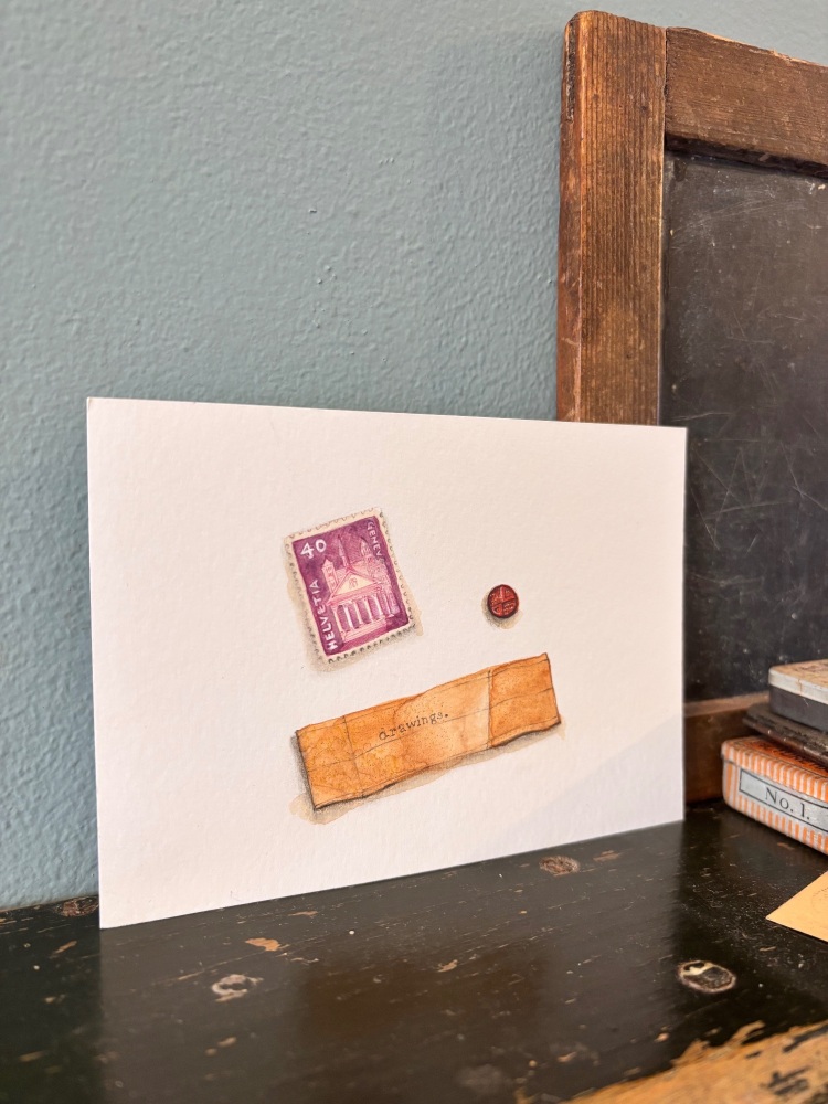 Purple stamp, tiny red button + drawer label