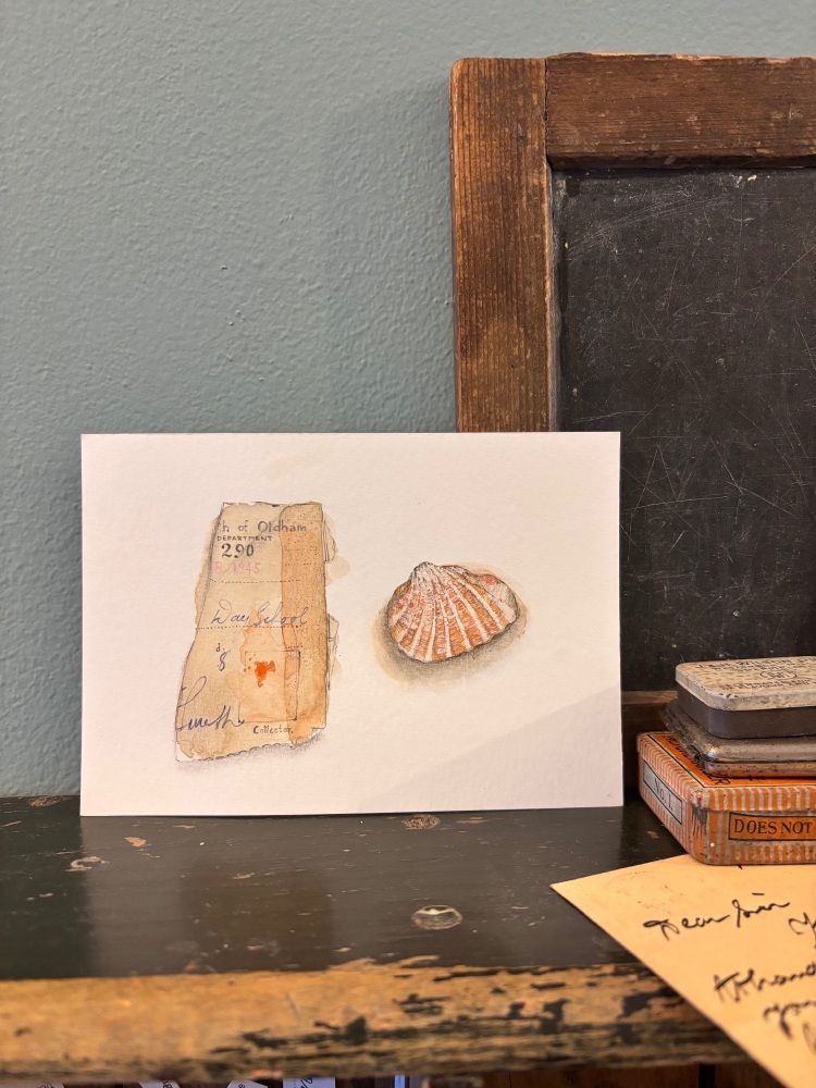 Scrap of vintage document + little shell