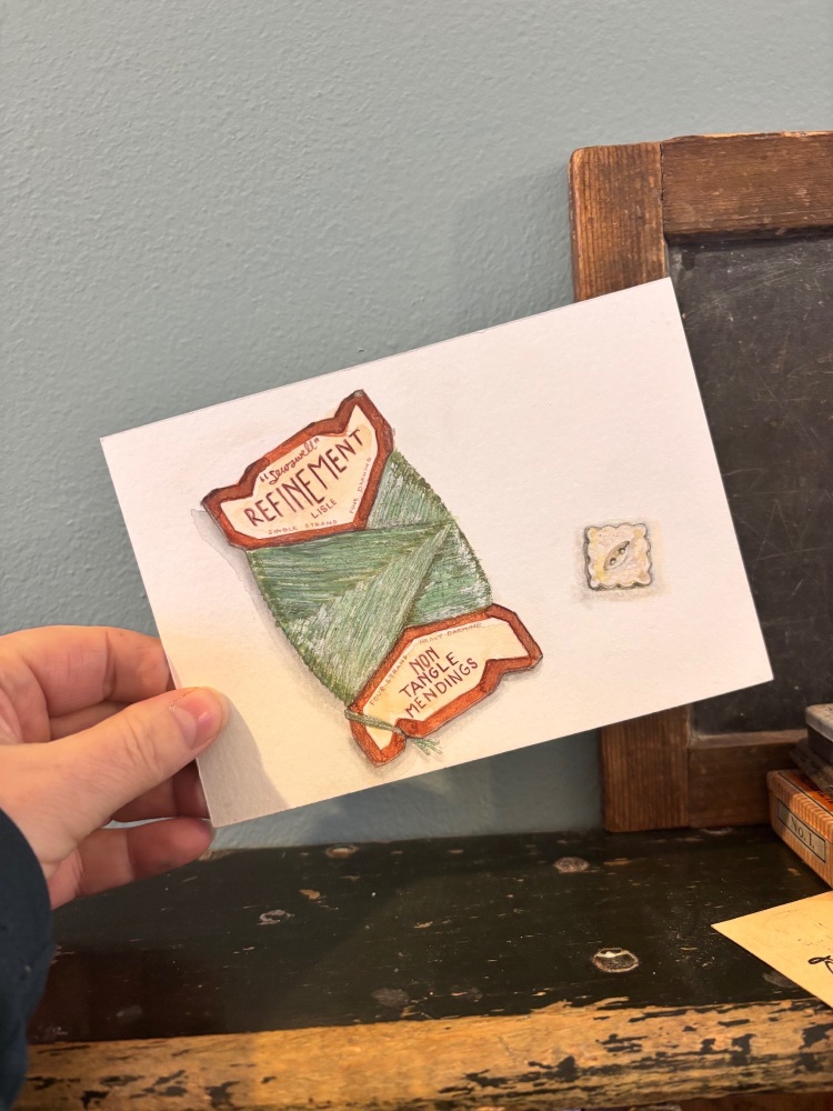 Mending wool + mother of pearl button