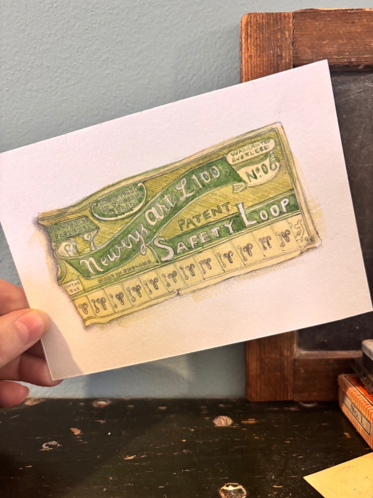 Green Newey&rsquo;s hooks and eyes card