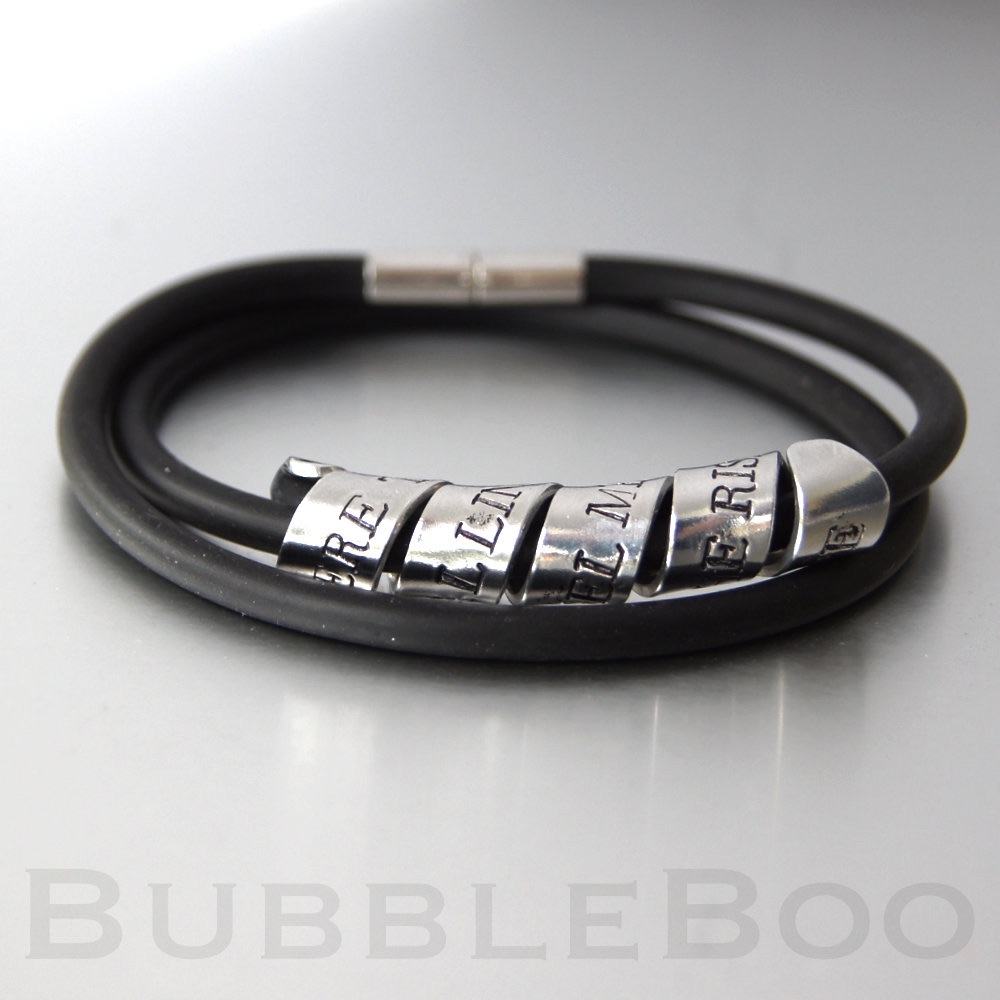 Secret Message bracelet on a double looped RUBBER strap with magnet clasp.