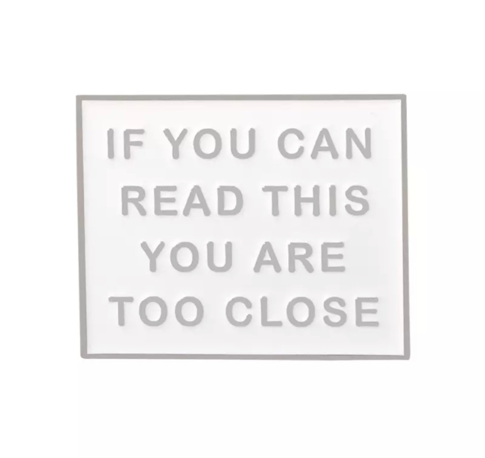    WHITE IF YOU CAN READ THIS ENAMEL PIN  BADGE