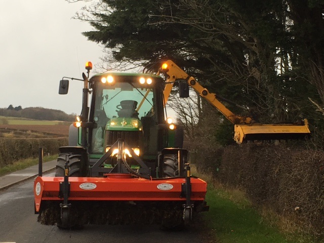 Hedgecutter with road sweeper and blower