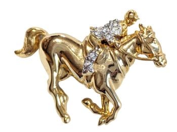 Vintage Cabouchon brooch with a galloping horse and a jockey with Austrian crystals.